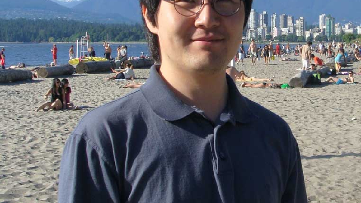 David Yu on a beach