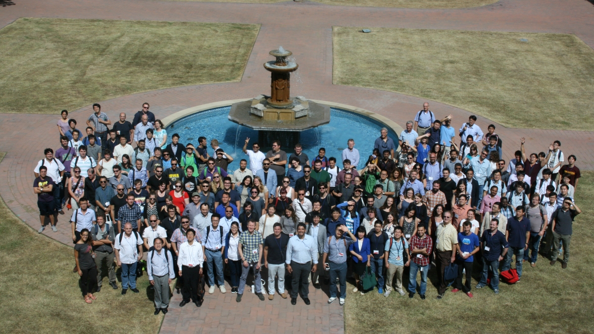 photo of group of people in front of fountain