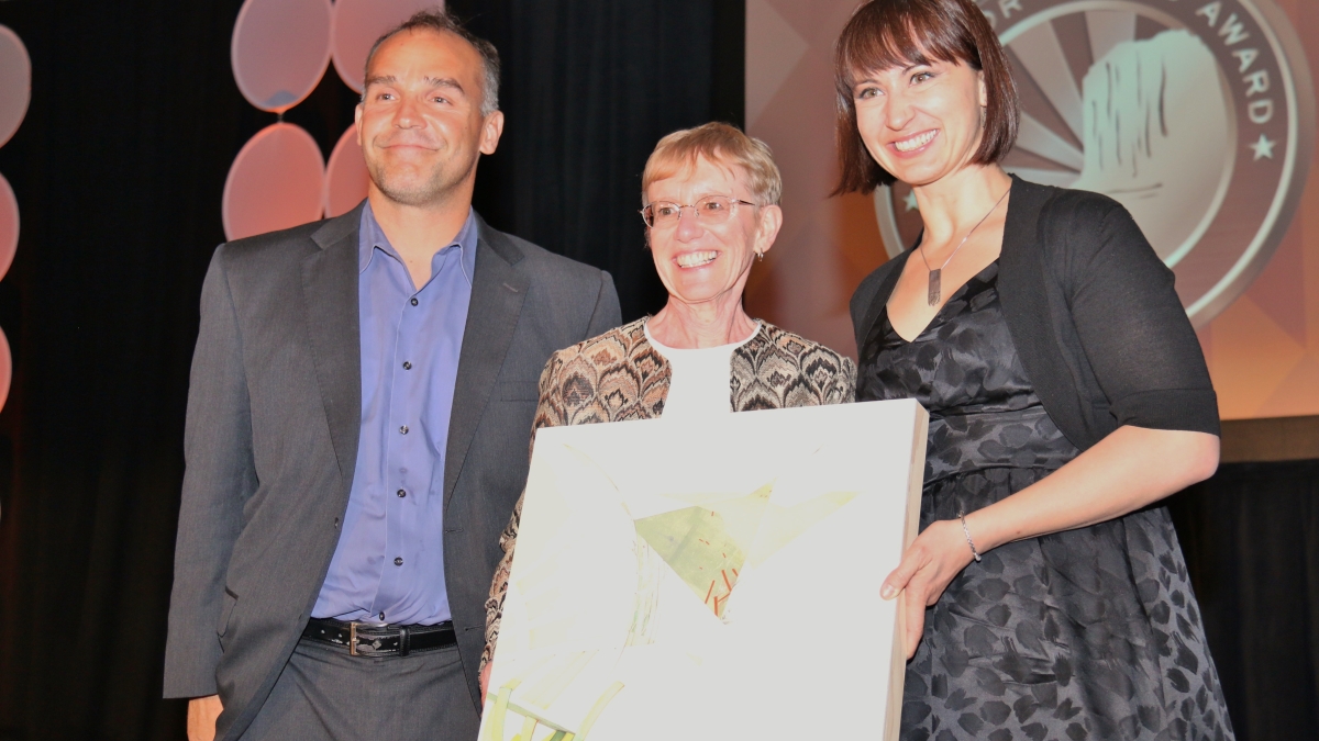 Marg Schmidt (center) receives her Governor&#039;s Arts Award from Rossitza Todorova,